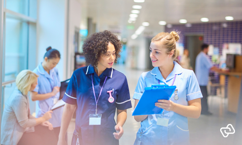 Frontline healthcare employees collaborating on scheduling and time tracking to improve workforce management and work-life balance